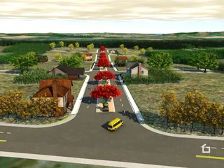 Vista externa de uma propriedade com paisagem rural e vegetação ao redor.