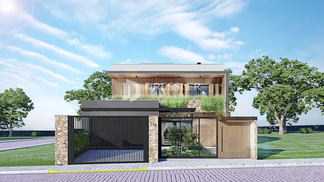 Fachada moderna de uma residência em Lajeado, Brasil, com portão de ferro e jardim.