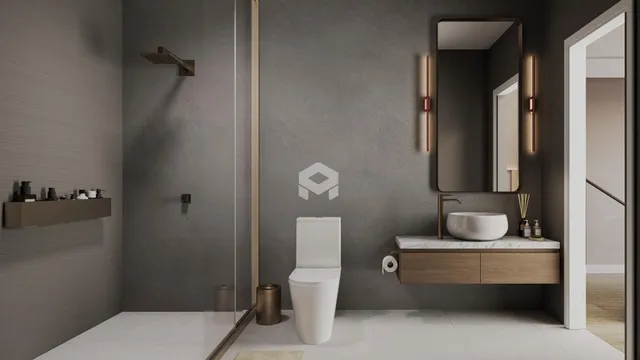 Banheiro moderno com revestimento cinza e bancada de madeira.