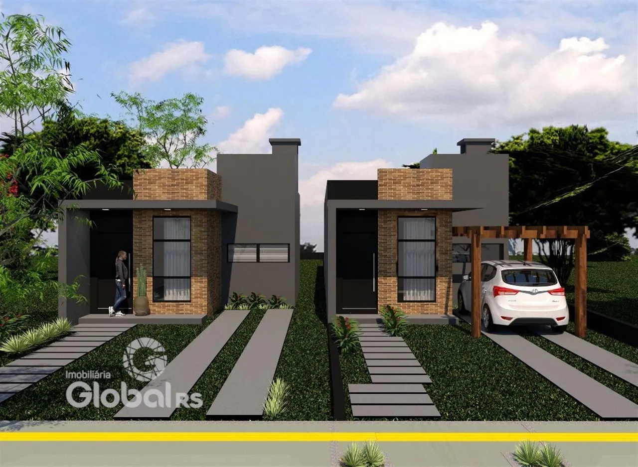 Fachada de residência moderna em Lajeado com jardim e entrada.