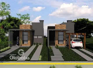 Fachada de residência moderna em Lajeado com jardim e entrada.