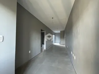 Corredor interno de uma residência em Lajeado, Brasil.