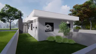 Fachada moderna de uma casa em Lajeado, Brasil, com jardim gramado.