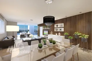 Sala de estar e jantar moderna com grandes janelas e decoração contemporânea.