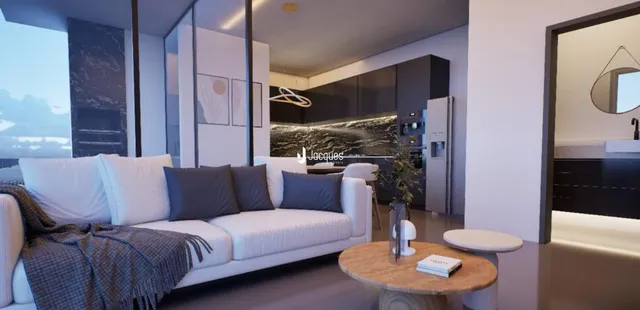 Sala de estar moderna com sofá branco e decoração contemporânea.