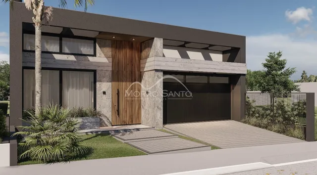 Fachada externa de uma casa moderna com revestimento de pedra e porta de madeira em Lajeado, Brasil.