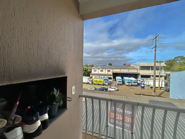 Vista externa de uma propriedade em Lajeado, Brasil, vista através de uma moldura de parede.