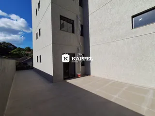 Fachada externa de um prédio residencial em Lajeado, Brasil.