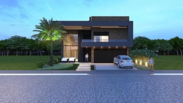 Fachada moderna de uma residência em Lajeado, Brasil, com paisagismo ao redor.