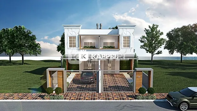 Fachada de uma casa residencial em Lajeado, Brasil, com jardim frontal.