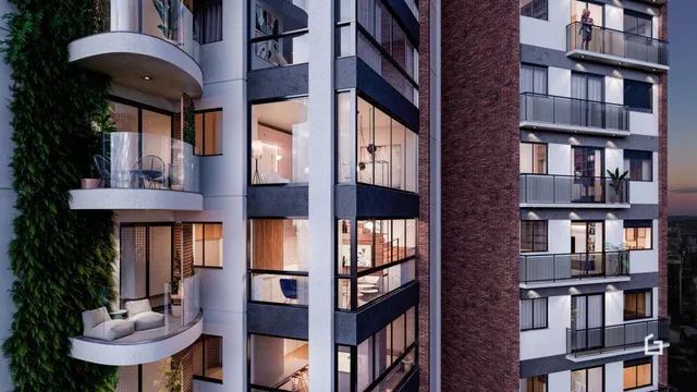 Fachada de um prédio residencial em Lajeado, Brasil com vários terraços.