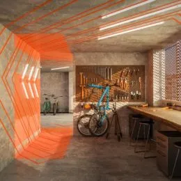 Ambiente interno com iluminação linear e parede texturizada em um imóvel.