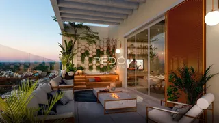 Sala de estar com vista panorâmica para a paisagem externa.
