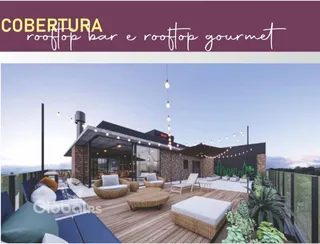 Vista de uma área gourmet externa com mobiliário de lazer em Lajeado.