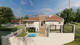 Fachada de uma casa com quintal e piscina.