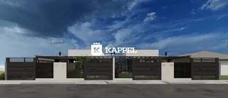 Fachada da casa com portão e sinalização da imobiliária K Kappel.
