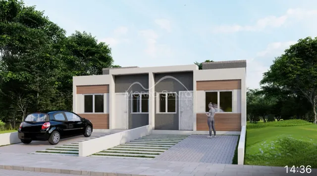 Fachada moderna de uma casa em Lajeado, Brasil, com jardim e garagem.