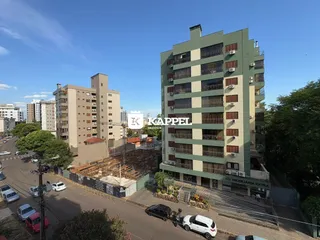 Foto da fachada de um prédio residencial alto em Lajeado, Brasil.