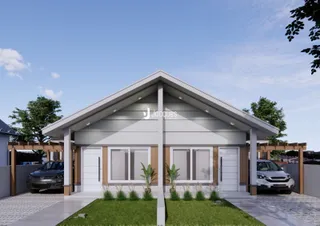 Fachada de uma casa moderna com garagem e área coberta em Lajeado.