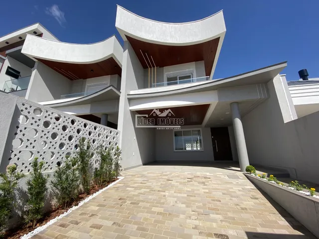 Foto da fachada de uma casa moderna em Lajeado, Brasil.
