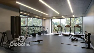 Uma foto de uma academia moderna com grandes janelas.