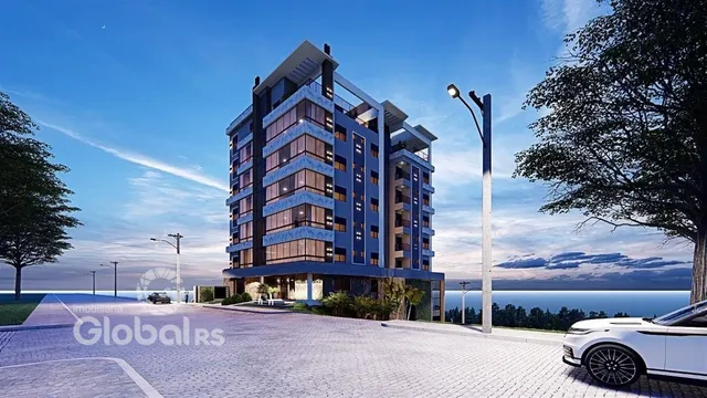 Fachada de um edifício residencial em Lajeado, Brasil, com vista para o oceano.
