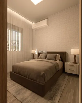 Quarto moderno com cama e cabeceira em um apartamento.