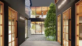 Fachada de um edifício comercial moderno em Lajeado com grandes janelas de vidro.