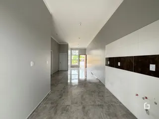 Foto do corredor interno de uma residência em Lajeado.