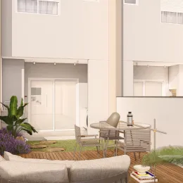 Foto de uma sala de estar com sofá e vista para o exterior.