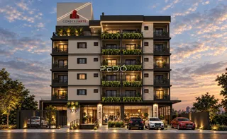Fachada de um prédio residencial em Lajeado, Brasil ao pôr do sol.
