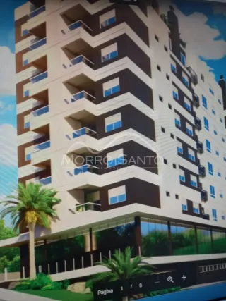Fachada moderna de um prédio residencial em Lajeado, Brasil, com vários andares e varandas.