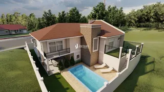 Fachada de uma casa residencial em Lajeado, Brasil, com telhado de telhas e área de lazer.