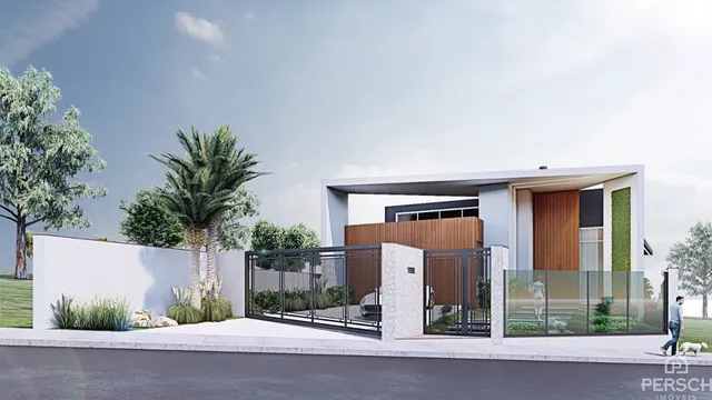 Fachada moderna de uma residência com portão de segurança em Lajeado, Brasil.