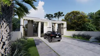 Fachada de uma casa moderna em Lajeado, Brasil com jardim e entrada.