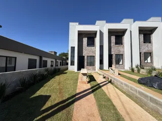 Exterior da fachada de um conjunto residencial moderno em Lajeado, Brasil.