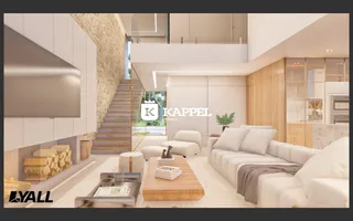 Sala de estar moderna com sofá e lareira em um apartamento.