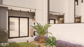 Vista da fachada de uma residência em Lajeado, Brasil com jardim.