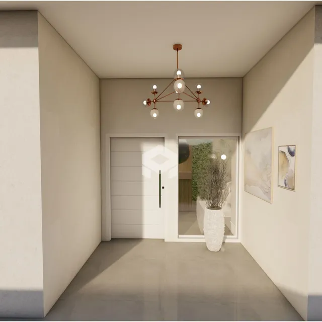 Hall da frente de uma área interna de uma propriedade em Lajeado.
