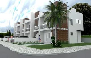 Fachada de uma casa moderna em Lajeado, Brasil, com jardim frontal e varandas.