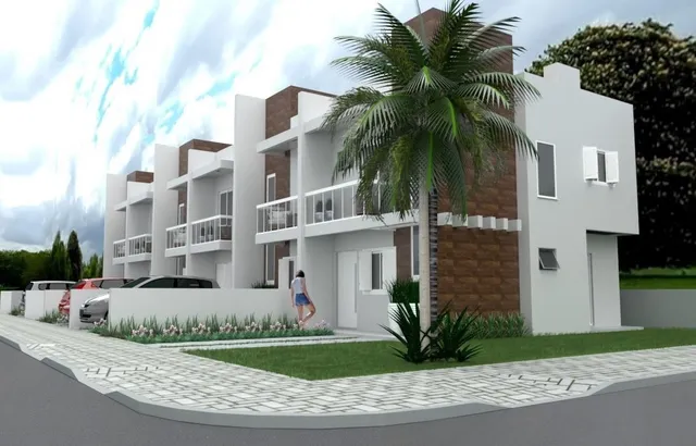 Fachada de uma casa moderna em Lajeado, Brasil, com jardim frontal e varandas.