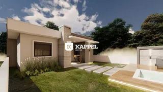 Fachada moderna de uma casa em Lajeado com jardim e deck de madeira.