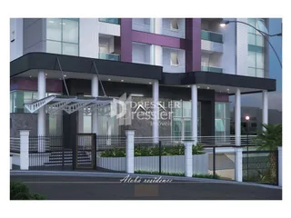 Fachada de um prédio residencial em Lajeado com portões de segurança.