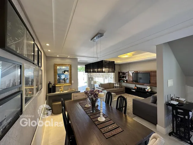 Ambiente moderno com mesa de jantar e sala de estar em imóvel no Brasil.
