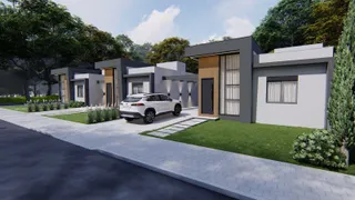 Fachada moderna de uma casa em Lajeado, Brasil, com jardim frontal e garagem.