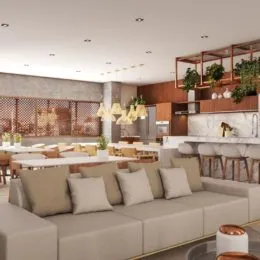 Sala de estar com sofá grande e área de jantar.