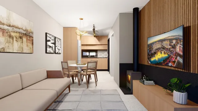 Sala de estar com sofá e mesa de jantar em um apartamento.
