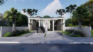 Fachada moderna de uma residência em Lajeado, Brasil, com paisagismo frontal.