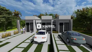 Fachada moderna de uma casa em Lajeado, Brasil, com estacionamento frontal.