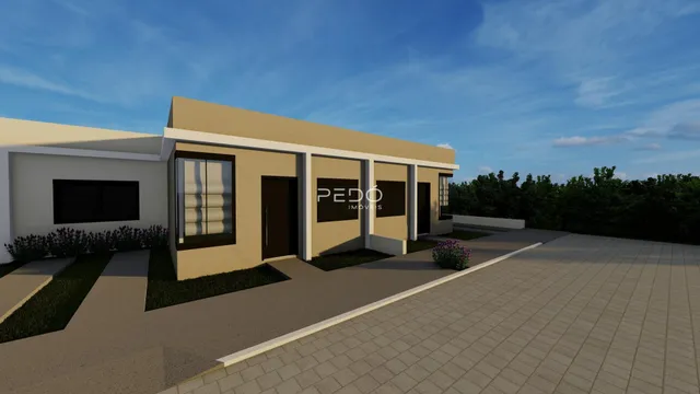 Fachada de uma residência em Lajeado, Brasil, com jardim frontal.